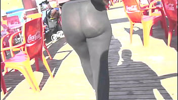 Booty sexy milf in the street with transparent legging,