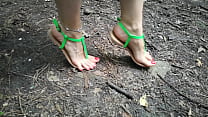 Sandals and red toes outdoors